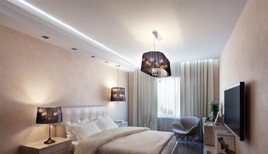 Двухуровневый натяжной потолок с подсветкой в спальной комнате
